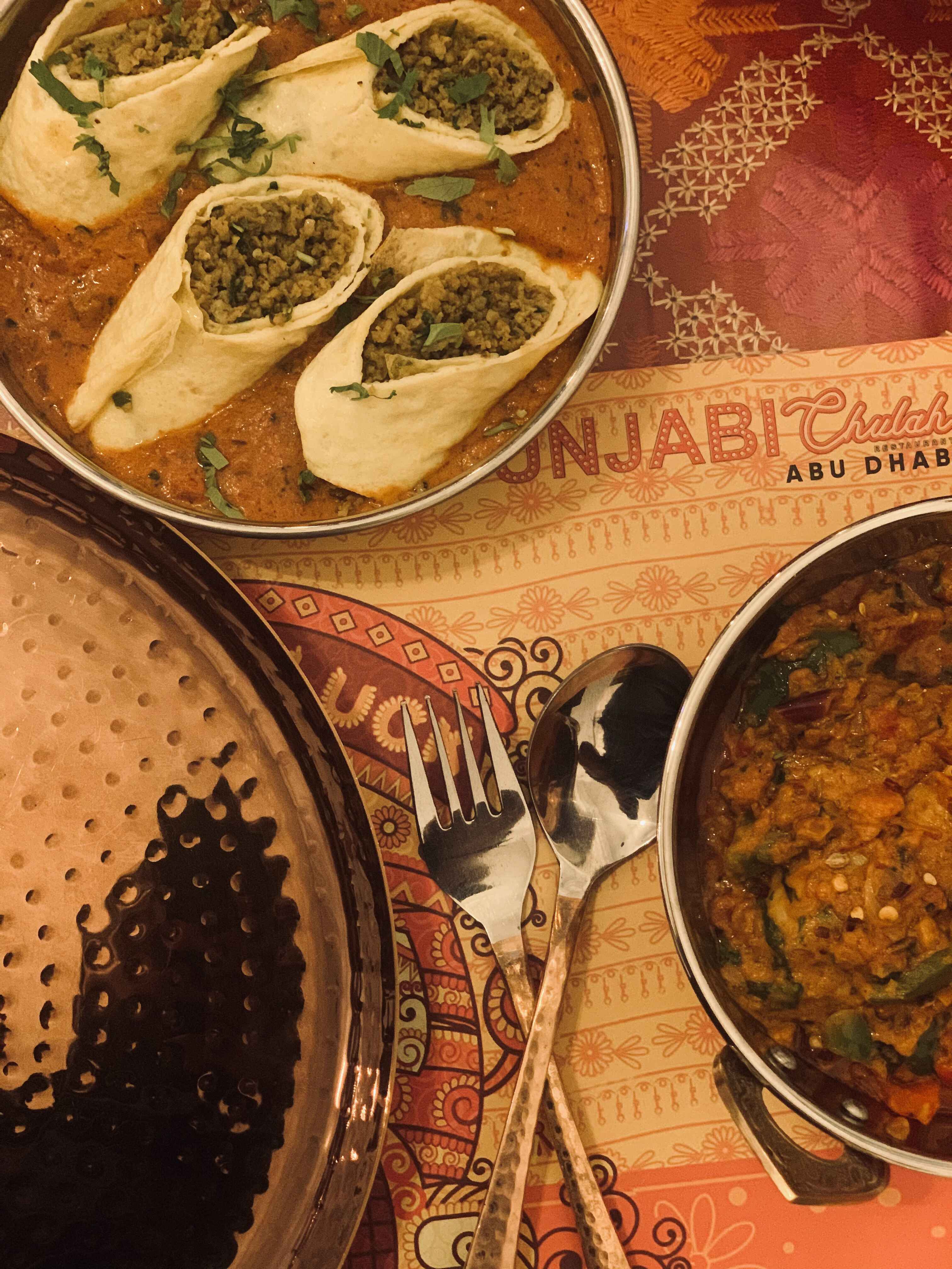 Indian dishes by Punjabi Chulha Abu Dhabi